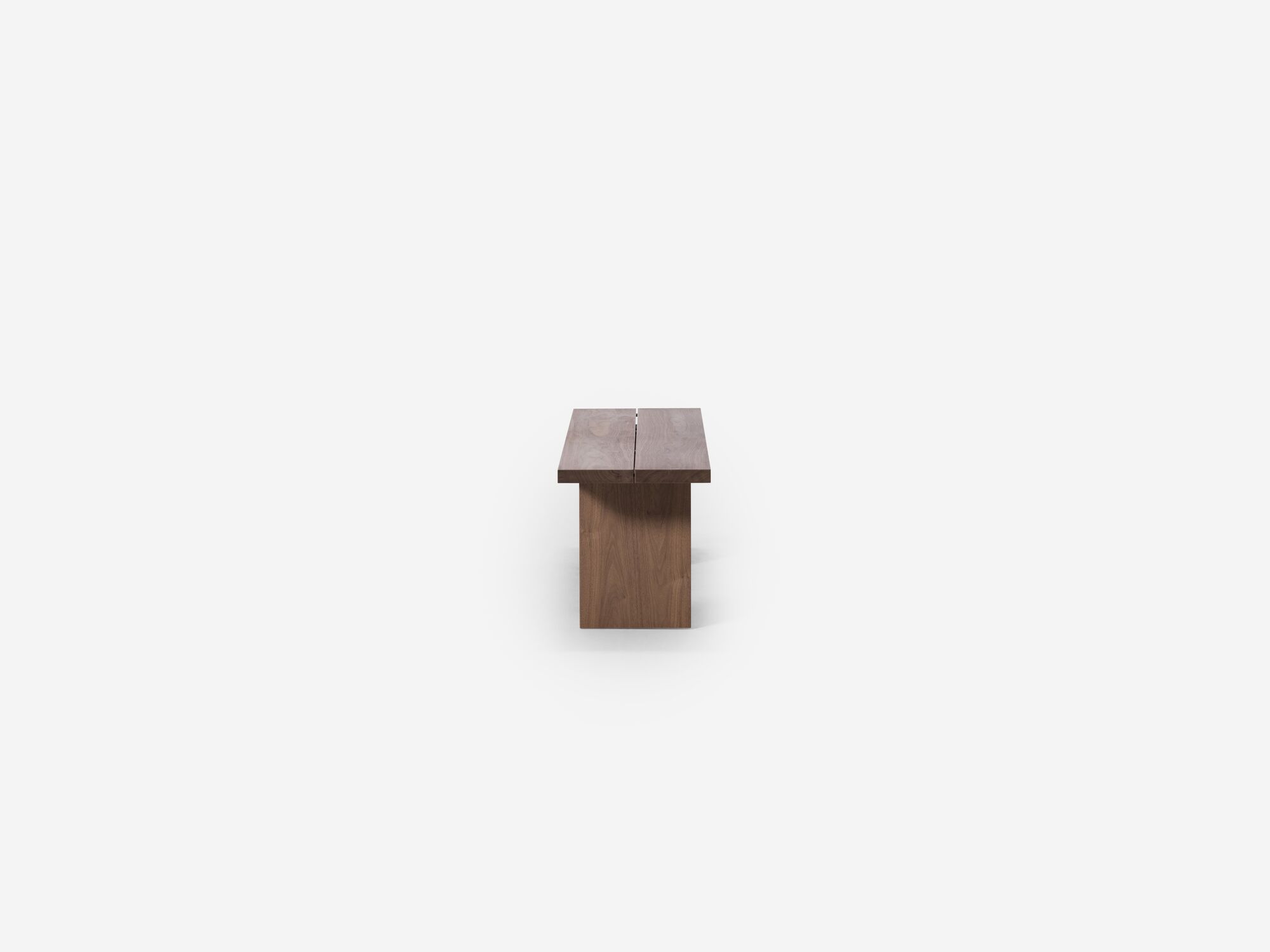 Side view of walnut dining bench